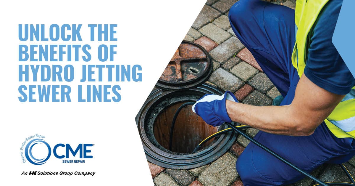 image showing a man performing sewer line hydro jetting.